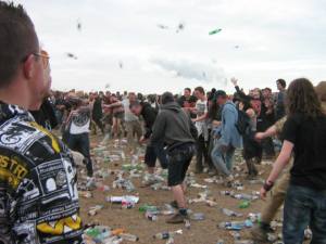 Bored, wet and hungover. The masses take to throwing shit!